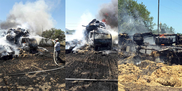 Elektrik tellerine temas eden saman yüklü kamyon yandı