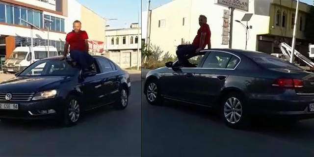 Arabayı tavanına oturup kullanan sürücüye ceza